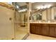 Elegant bathroom with double vanity and large shower at 3894 E Ebano St, Gilbert, AZ 85295