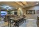 Bright dining area with wooden farmhouse table and seating for six at 3894 E Ebano St, Gilbert, AZ 85295