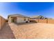 Large backyard with view of neighboring homes at 40130 W Sunland Dr, Maricopa, AZ 85138