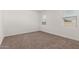 Spacious bedroom with carpet and neutral wall colors at 40130 W Sunland Dr, Maricopa, AZ 85138