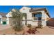 Charming home exterior with landscaping and attached garage at 40130 W Sunland Dr, Maricopa, AZ 85138