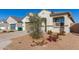 New construction home with attached garage and desert landscaping at 40130 W Sunland Dr, Maricopa, AZ 85138