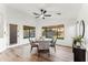 Casual dining area with a round table set and view to backyard at 40864 W Novak Ln, Maricopa, AZ 85138