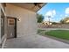 Covered patio with access to backyard and ceiling fan at 40864 W Novak Ln, Maricopa, AZ 85138