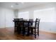 Simple dining room with hardwood floors and large windows at 4320 W Keim Dr, Glendale, AZ 85301