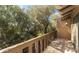 Private balcony overlooking lush trees and landscape at 4446 E Camelback Rd # 109, Phoenix, AZ 85018