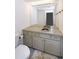 Bathroom with tiled vanity and large mirror at 4446 E Camelback Rd # 109, Phoenix, AZ 85018