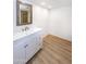 Bathroom with white vanity, modern sink, and vinyl flooring at 4446 E Camelback Rd # 109, Phoenix, AZ 85018