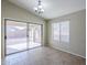 Dining area with sliding glass doors leading to the patio at 44865 W Horse Mesa Rd, Maricopa, AZ 85139