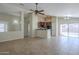 Kitchen with dark wood cabinets, black appliances, and a breakfast bar at 44865 W Horse Mesa Rd, Maricopa, AZ 85139