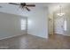 Bright living room with tile flooring and neutral walls at 44865 W Horse Mesa Rd, Maricopa, AZ 85139