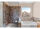 Updated bathroom with walk-in shower and soaking tub at 4601 E Peak View Rd, Cave Creek, AZ 85331