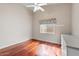 Bright bedroom with wood floors and built-in shelving at 4601 E Peak View Rd, Cave Creek, AZ 85331