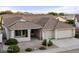 House exterior with tile roof and two-car garage at 4601 E Peak View Rd, Cave Creek, AZ 85331