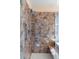 Large walk-in shower with grab bars and tiled walls at 4601 E Peak View Rd, Cave Creek, AZ 85331