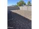 Backyard with gravel and a view of the AC unit at 4744 W Orange Ave, Coolidge, AZ 85128