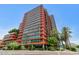 Modern high-rise building with orange and glass accents at 4808 N 24Th St # 803, Phoenix, AZ 85016