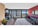 Modern living room with floor-to-ceiling windows and city views at 4808 N 24Th St # 803, Phoenix, AZ 85016