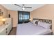 Main bedroom with king-size bed and city view at 4808 N 24Th St # 803, Phoenix, AZ 85016