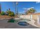 Inviting kidney-shaped pool with a spa, surrounded by a rock patio at 4944 E Windrose Dr, Scottsdale, AZ 85254