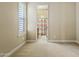 Spacious bedroom with wood flooring and view of en-suite bathroom at 5045 S Mingus Pl, Chandler, AZ 85249