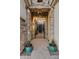 Elegant entry with stone pillars and a wrought-iron gate at 5045 S Mingus Pl, Chandler, AZ 85249