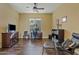 Bright home office with built-in shelving and hardwood floors at 5045 S Mingus Pl, Chandler, AZ 85249