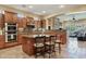 Gourmet kitchen with ample cabinetry, stainless steel appliances, and an island at 5045 S Mingus Pl, Chandler, AZ 85249