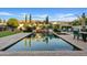 Sparkling rectangular pool with spa and spacious patio at 5045 S Mingus Pl, Chandler, AZ 85249