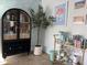 Well-stocked bar area with a liquor cabinet and a coffee bar cart at 6318 N 14Th St, Phoenix, AZ 85014