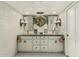 Elegant bathroom with double vanity and a chandelier at 6318 N 14Th St, Phoenix, AZ 85014