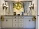 Modern bathroom with double vanity and statement lighting at 6318 N 14Th St, Phoenix, AZ 85014