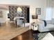 Elegant dining room with patterned wallpaper, chandelier, and modern table at 6318 N 14Th St, Phoenix, AZ 85014