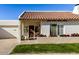 Charming single-story home with a terracotta tile roof and well-manicured lawn at 6318 N 14Th St, Phoenix, AZ 85014