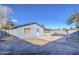 Home's backyard with patio and space for landscaping at 6355 W Caron St, Glendale, AZ 85302