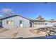 View of the home's backyard, showing patio and surrounding area at 6355 W Caron St, Glendale, AZ 85302