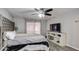 Spacious bedroom with a TV and lots of natural light at 6355 W Caron St, Glendale, AZ 85302