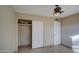 Small bedroom with a closet and ceiling fan at 6355 W Caron St, Glendale, AZ 85302