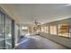 Sunroom with tile floor and ceiling fan at 6355 W Caron St, Glendale, AZ 85302