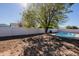 Backyard view of property showcasing a pool area at 7101 W Laurel Ln, Peoria, AZ 85345