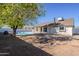 Backyard with a pool and partially visible house at 7101 W Laurel Ln, Peoria, AZ 85345