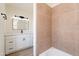 Updated bathroom with white vanity, new tile and bathtub at 7101 W Laurel Ln, Peoria, AZ 85345