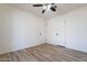 Bedroom with two closets and ceiling fan at 7101 W Laurel Ln, Peoria, AZ 85345