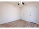 Bedroom with two closets and ceiling fan at 7101 W Laurel Ln, Peoria, AZ 85345