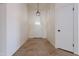 Bright and airy entryway with tile flooring and a coat closet at 7101 W Laurel Ln, Peoria, AZ 85345