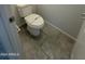 Clean bathroom with toilet and tile floor at 7309 S 17Th Dr, Phoenix, AZ 85041