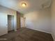 Bright bedroom featuring a closet and neutral wall colors at 7309 S 17Th Dr, Phoenix, AZ 85041