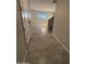 Tile entryway with view to the living room and stairs at 7309 S 17Th Dr, Phoenix, AZ 85041