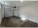 Attached garage with an automatic garage door opener and extra storage at 7309 S 17Th Dr, Phoenix, AZ 85041