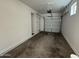 Attached garage with overhead door and ample space at 7309 S 17Th Dr, Phoenix, AZ 85041